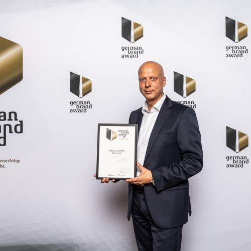 STIEBEL ELTRON Marketing Manager Claus Kroll-Schlüter is delighted to receive the German Brand Award.